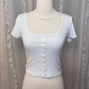 A white scoop neck top